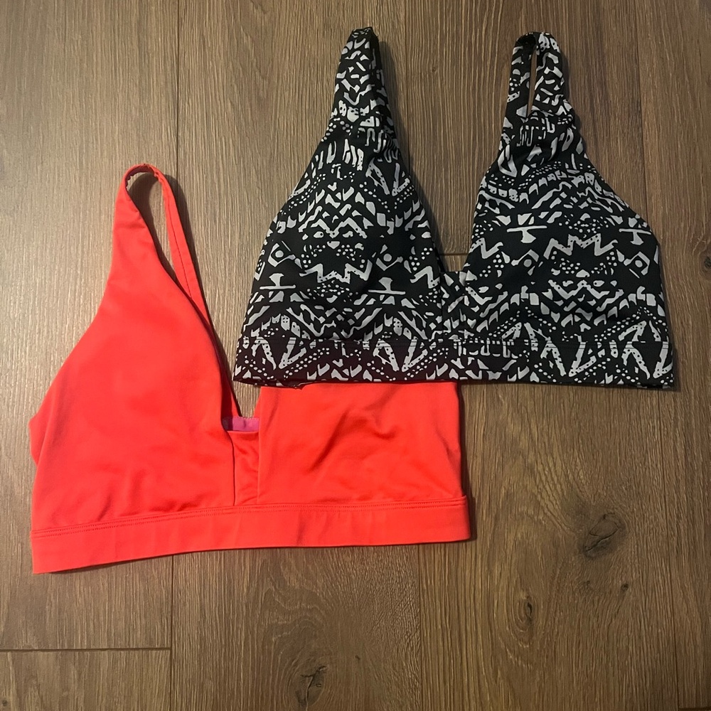 Black and White Patterned Sports Bra and Red Sports Bra